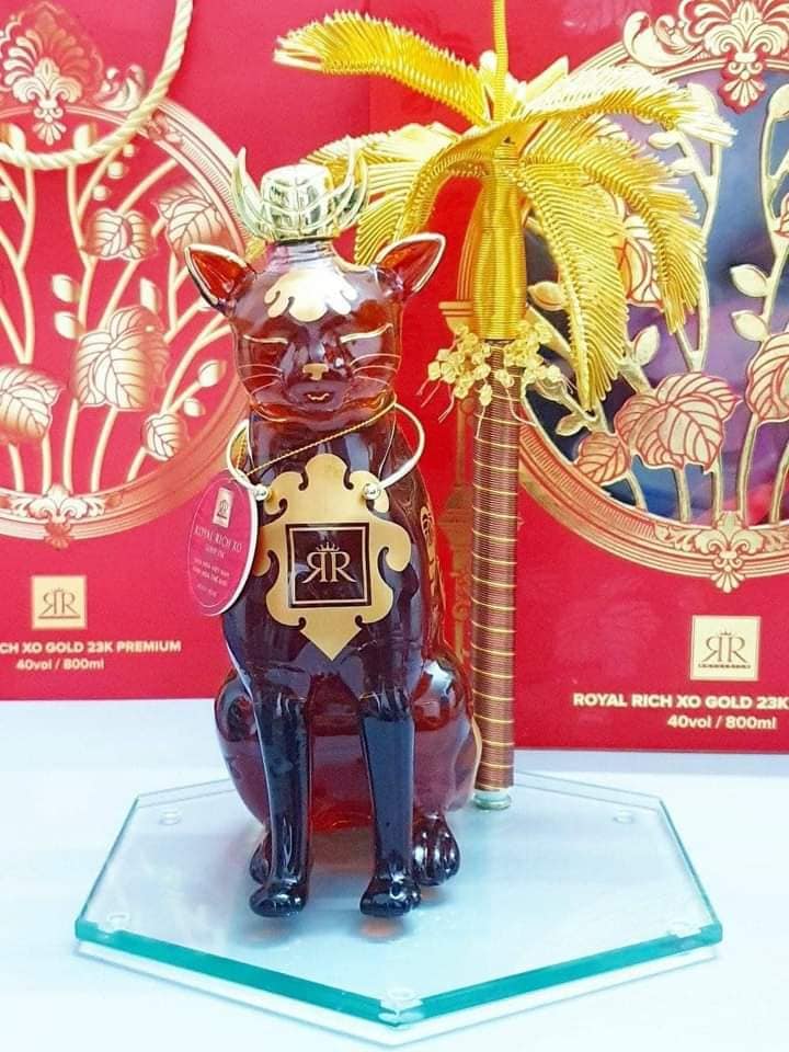 RƯỢU MÈO ĐÔNG HỒ ngồi dưới cây cau vàng - Royal Rich XO Gold 23K PREMIUM hồ chí minh